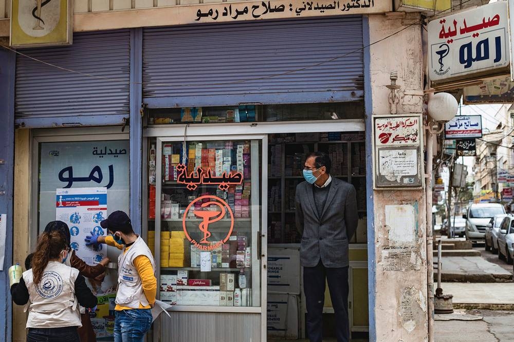 Health staff from the Shaboura Health Center in Rafah, Gaza, run by UN relief agency UNRWA, deliver medications directly to elderly Palestine refugees in the wake of COVID-19, so reduce their chances of exposure.