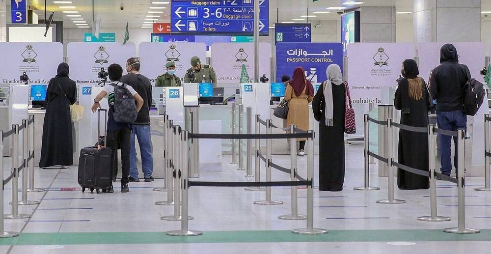 Repatriated Saudi passengers arrive on saudi flights from Houston, Beirut and Nairobi.