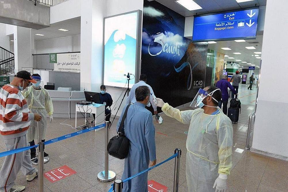 Repatriated Saudi passengers arrive on saudi flights from Houston, Beirut and Nairobi.