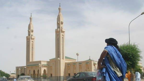 A man walks near a mosque in Nouakchott, Mauritania in this file photo
