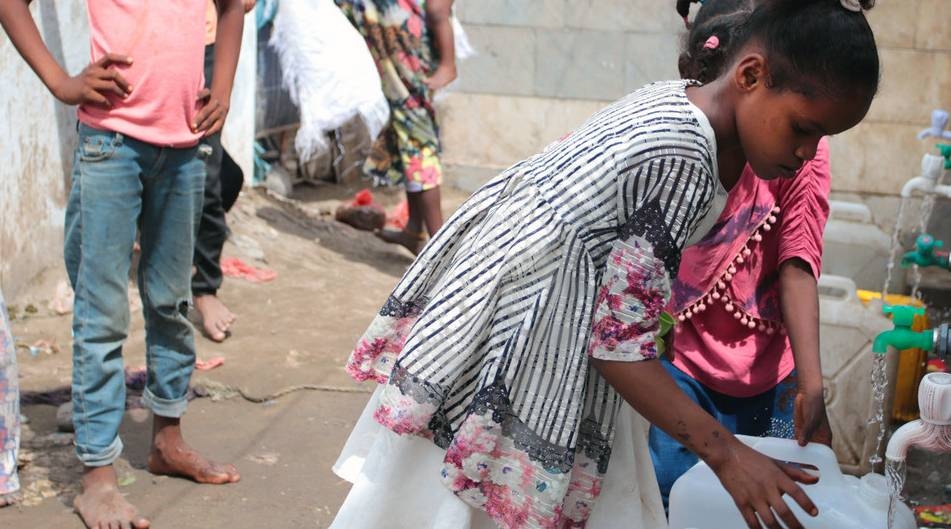 In the Omar Bin Yasser camp in Aden families are in short supply of soap, they have to line up for clean water and schools are closed. To compound the threat of COVID-19 they are now dealing with flooding and an increased risk of cholera. — courtesy photo UNICEF