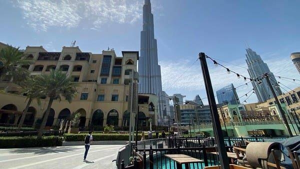 People walk outside Dubai mall after the UAE government eased a curfew and allowed stores to open in Dubai. -- Courtesy photo
