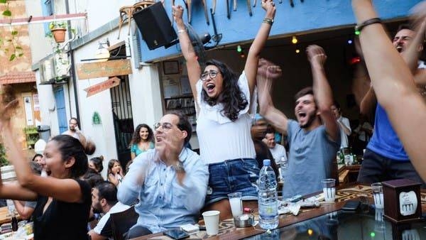 Cafe Em Nazih, a popular restaurant in Beirut, is shown full of patrons during a 2018 World Cup game. Now, compounding economic and coronavirus crises leave the restaurant facing an uncertain future, -- Courtesy photos

