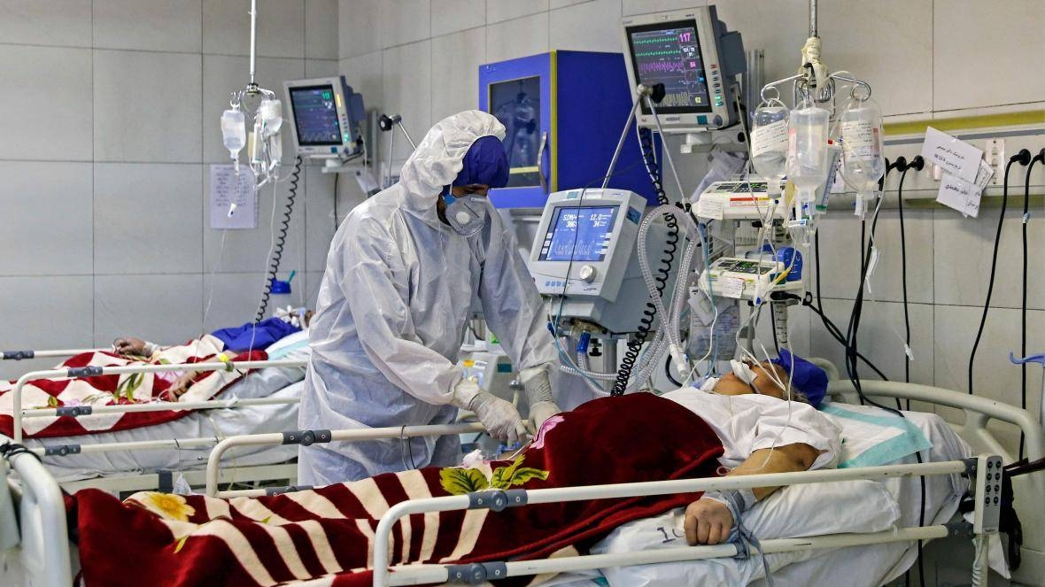 A medic treats a patient infected with the COVID-19 virus at a hospital in Cairo. -- Courtesy photo
