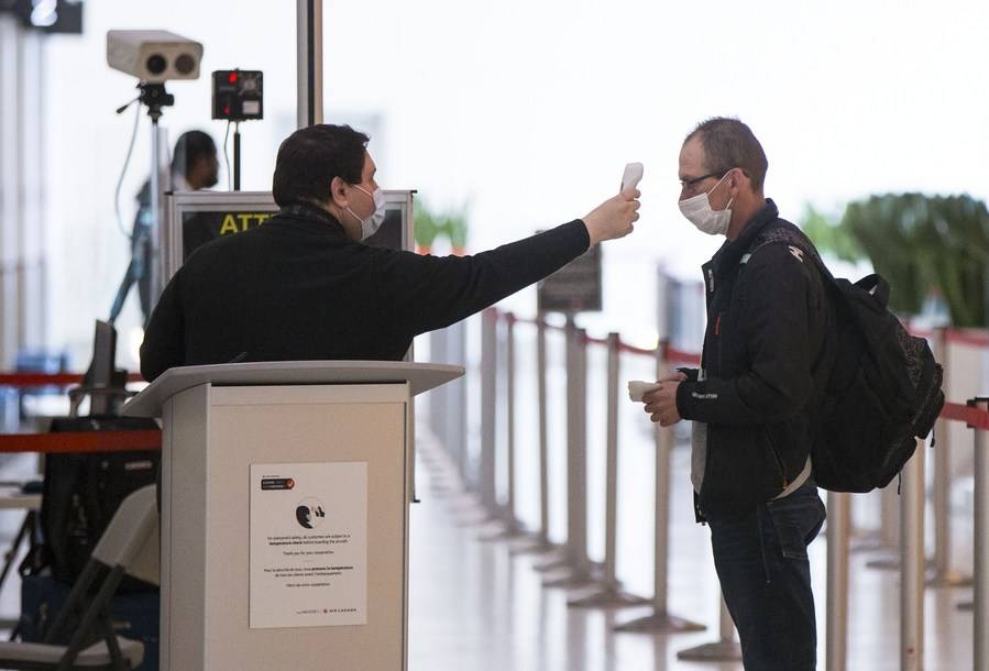 Temperature checks at airports are expected to complement a number of measures already in place, including mandatory mask-wearing for all passengers and staff, enhanced cleaning protocols and physical distancing in airports. — File photo