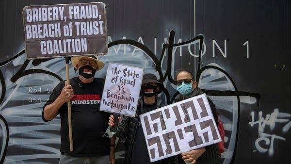 People protest against Prime Minister Benjamin Netanyahu outside his residence in occupied Jerusalem last month. — Courtesy photo
