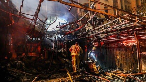 First responders search for survivors at the scene of an explosion at the medical center in northern Tehran on Tuesday. — Courtesy photo
