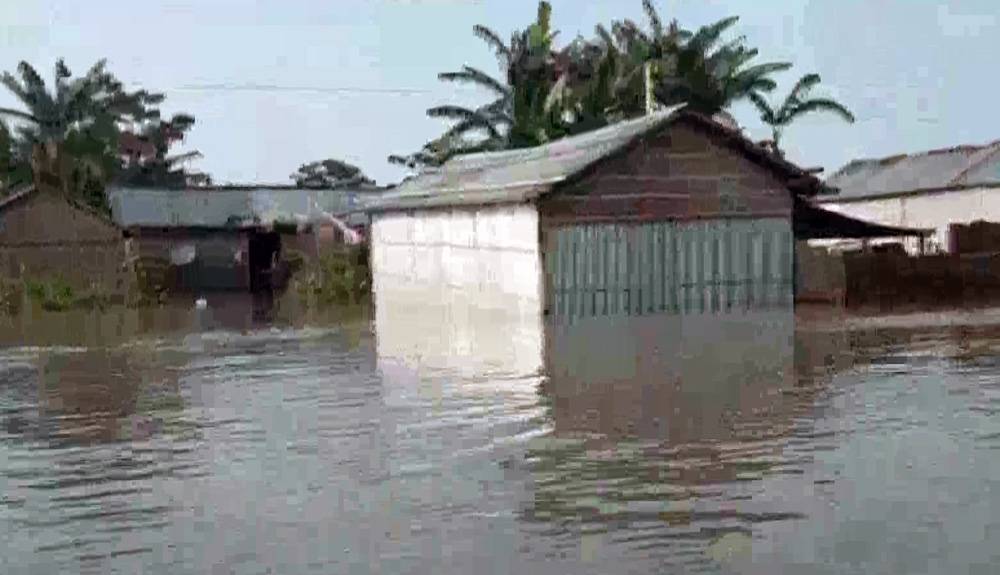 Picture shows villages in Assam are under water following incessant rains. — courtesy ANI