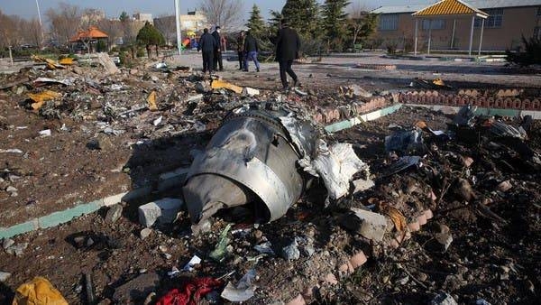 Rescue teams work amidst debris after a Ukrainian plane crashed near the airport in Tehran — File photo 
