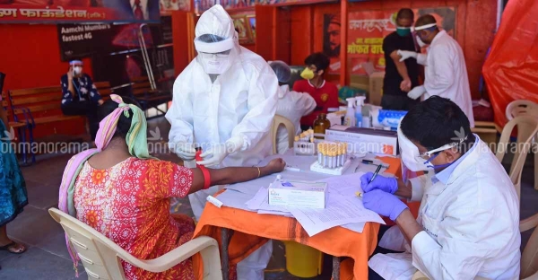 Medics conduct COVID-19 screening at Dharavi area in Mumbai. — Courtesy photo
