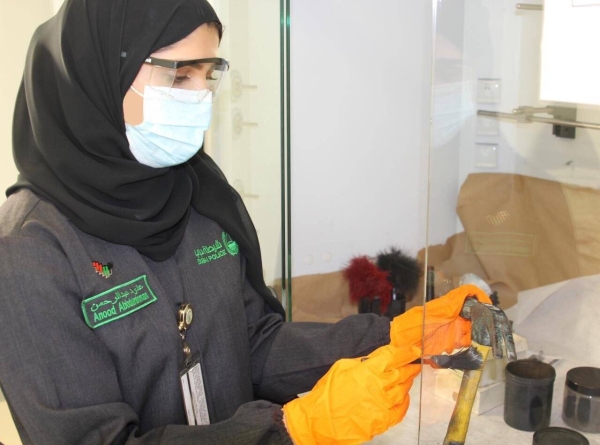 Assistant expert Anoud Abdul Rahman Al Nasser is the first UAE female to join the section of chemical manifestation of fingerprints of the Dubai Police's General Department of Forensic Science and Criminology. — WAM photo
