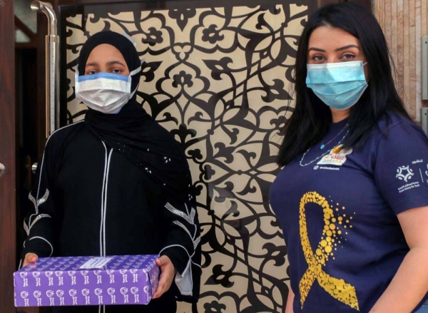 Volunteers in Smile Initiative, an initiative of Bahrain Future Society for Youth, distributed gifts to kids with cancer at their houses in Bahrain. 