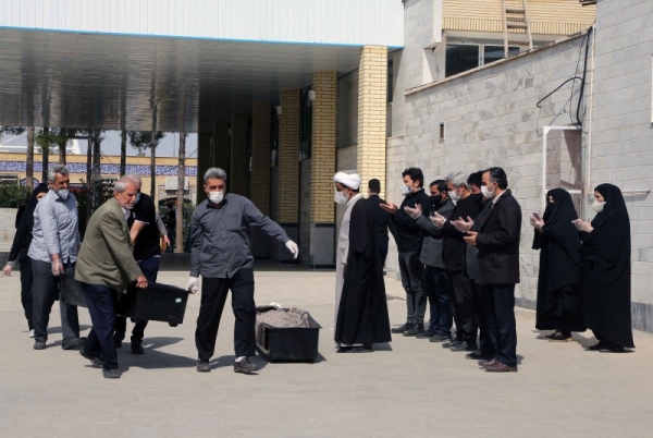 Funeral prayer is performed at Beheshte Masoumeh Cemetery for the victims of coronavirus (COVID-19) in Qom, Iran, in this March 17, 2020 file picture. — Courtesy photo