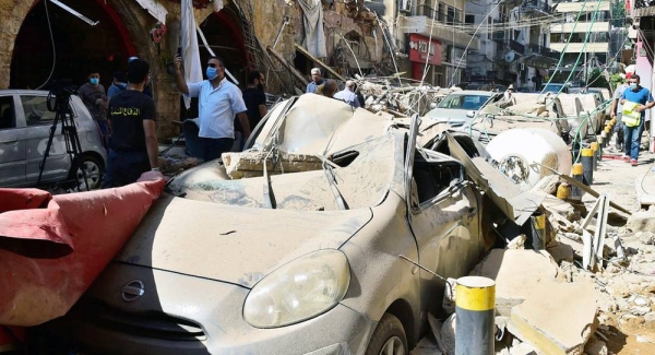 A deadly explosion at Beirut Port wreaks havoc throughout Lebanon's capital city. — courtesy UNOCHA




A woman in Beirut searches through the rubble that was once her home after a blast on 4 August pummeled her home. — courtesy UNOCHA