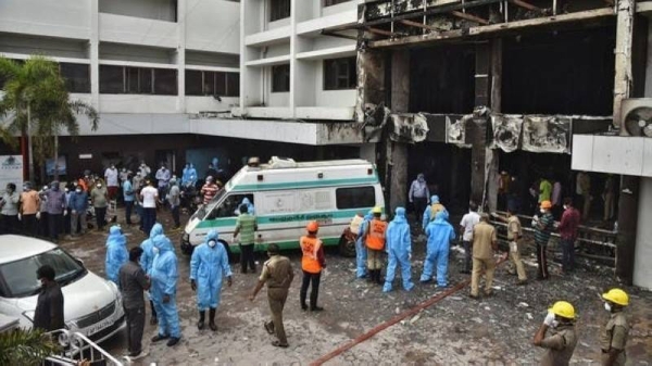 Rescue workers on Sunday look for survivors after a fire broke out in a hotel that was being used as a coronavirus disease (COVID-19) facility in Vijayawada, in the southern Indian state of Andhra Pradesh. — Courtesy photo 