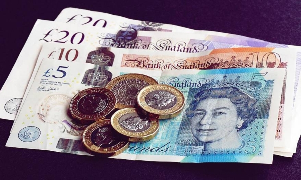 Sterling remained firmed against a stronger US dollar on the back of encouraging economic data. 