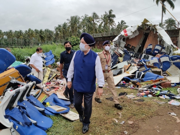 Local people engage in rescue mission at the site of the plane crash in Kozhikode.