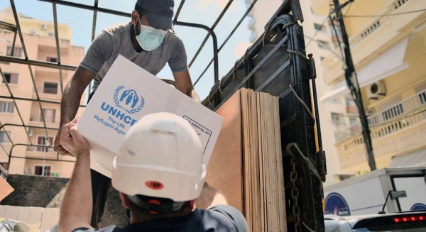 The UN refugee chief Filippo Grandi looks at damage caused to the apartment of a Syrian refugee in the aftermath of the explosion at the port in Beirut, Lebanon. – courtesy UNHCR/Sam Tarling