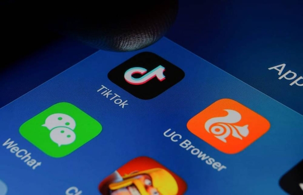 WeChat and Tik Tok apps seen in this mobile.