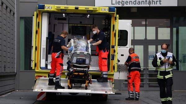 Paramedics load a stretcher into an ambulance that allegedly transported Russian opposition leader Alexei Navalny at Charite Mitte Hospital Complex to receive medical treatment in Berlin, Germany. — Courtesy photo