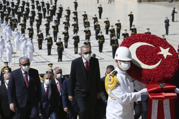 Turkish President Recep Tayyip Erdogan follows a military honor guard during a ceremony at the mausoleum of Mustafa Kemal Ataturk, founder of modern Turkey, in Ankara, Sunday. — Courtesy photo