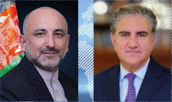 Pakistani Foreign Minister Shah Mahmood Qureshi, right, on Thursday held telephone talks with Afghanistan’s acting Foreign Minister Mohammed Haneef Atmar, left. — Courtesy photo