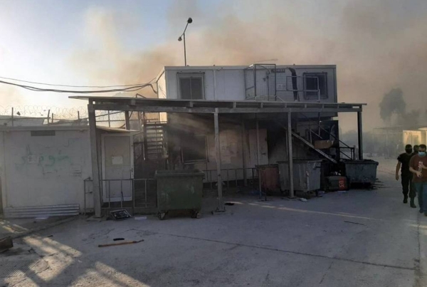 Fire damaged housing for refugees and asylum seekers at Moria camp, Lesvos, Greece.  — courtesy UNHCR