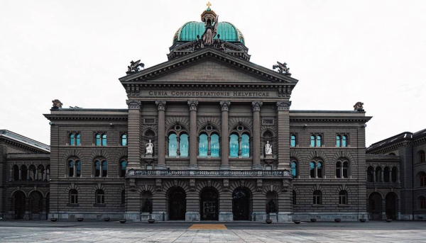 The Swiss parliament building in the capital, Bern. — courtesy Unsplash/Claudio Schwarz