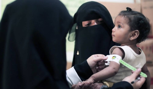 A health care worker prepares a diphtheria vaccine at Khawr Meksar clinic in Aden, Yemen, despite the COVID-19 pandemic. — courtesy UNICEF/Mahmoud Fahdl