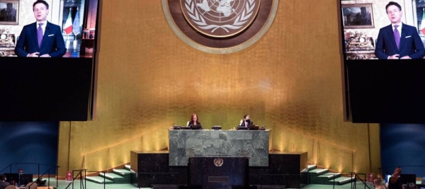 Giuseppe Conte (on screen), president of the Council of Ministers of the Republic of Italy, addresses the general debate of the General Assembly’s seventy-fifth session. — courtesy UN Photo/Evan Schneider