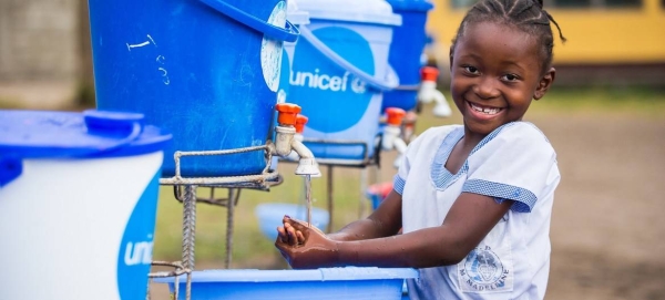 A young girl washes her hands at a primary school in the Democratic Republic of the Congo. — Courtesy photo