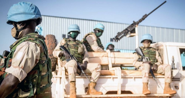 Peacekeepers serving with the UN's Multidimensional Integrated Stabilization Mission in Mali (MINUSMA) wear face masks while on patrol. — courtesy MINUSMA/Harandane Dicko
