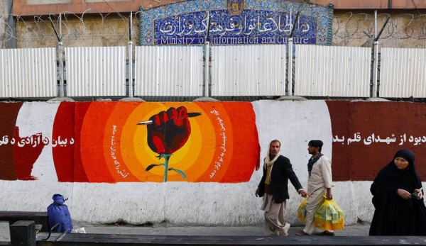 A mural on a blast wall in downtown Kabul commemorates journalists killed in Afghanistan in 2016. — courtesy UNAMA/Fardin Waezi