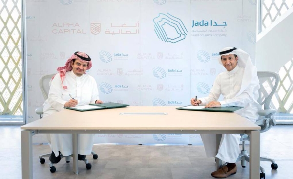 Adel Al-Ateeq, CEO of Jada, the Fund of Funds Company, right, and Fahad Bin Khaled Al-Saud, CEO of Alpha Capital, during the signing ceremony.