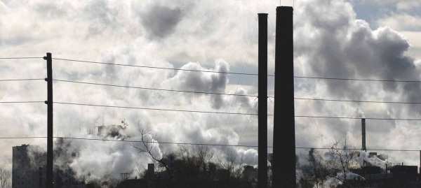 Emissions at a manufacturing complex in Toronto, Canada, in this file picture. — Courtesy photo