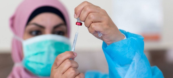 A nurse prepares a vaccine at a clinic in Ramallah in Palestine in this file picture. — Courtesy photo