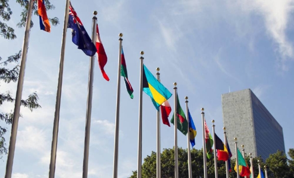 Flags outside the UN Secretariat building. — courtesy UN Photo/Rick Bajornas