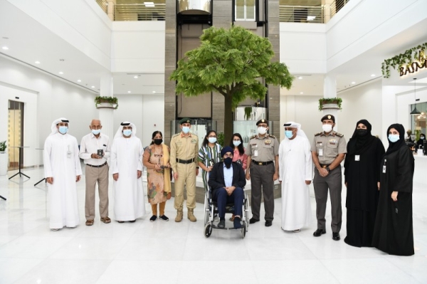 Lt. Gen Al Marri handed over the golden visas to the two sisters and their grandparents when he received them at the General Directorate of Residency and Foreigners Affairs in Dubai headquarters. — WAM photo