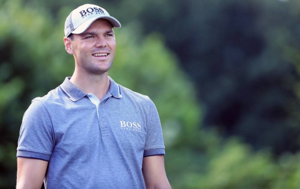 Martin Kaymer of Germany poses with the trophy after winning The Abu Dhabi HSBC Golf Championship at Abu Dhabi Golf Club on Jan. 23, 2011 in Abu Dhabi, UAE.  — courtesy Andrew Redington