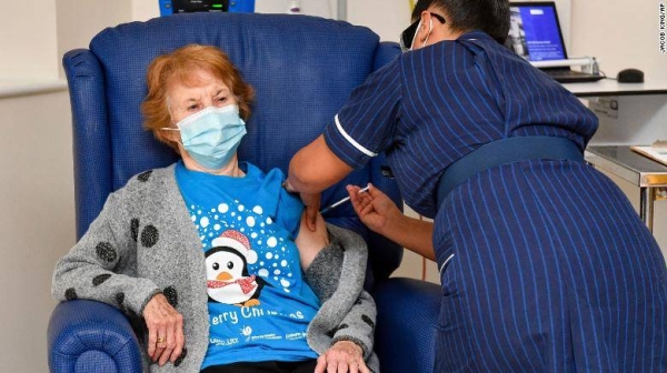 A nurse administers the Pfizer-BioNTech Covid-19 vaccine to Margaret Keenan, 90. — Courtesy photo