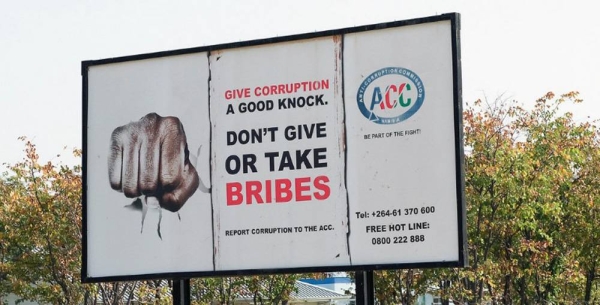 A billboard in Namibia, which calls on everyone to neither offer nor accept bribes. — courtesy World Bank/Philip Schuler