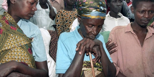 

(File/1998) Genocide survivors at the Mwurire Genocide Site, in Rwanda.
— courtesy UN Photo/Milton Grant