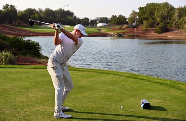 Victor Perez of France tees off on the 1st hole during Day One of the DP World Tour Championship at Jumeirah Golf Estates on Dec. 10, 2020 in Dubai, United Arab Emirates. (Photo by Andrew Redington)