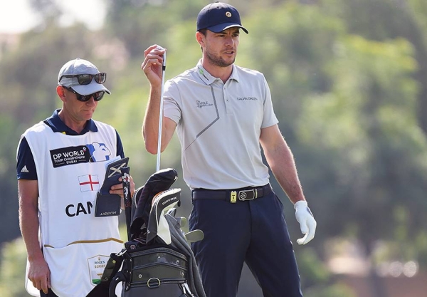 Patrick Reed of US prepares to tee off the 1st hole during Day Two of the DP World Tour Championship at Jumeirah Golf Estates on Dec. 11, 2020 in Dubai, United Arab Emirates. (Photo by Andrew Redington)