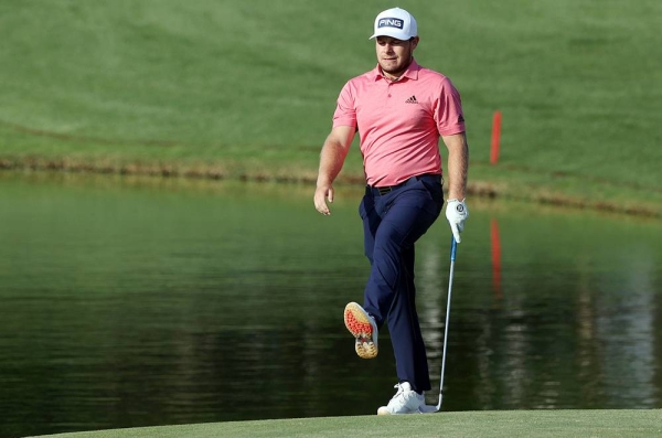 Patrick Reed of US prepares to tee off the 1st hole during Day Two of the DP World Tour Championship at Jumeirah Golf Estates on Dec. 11, 2020 in Dubai, United Arab Emirates. (Photo by Andrew Redington)