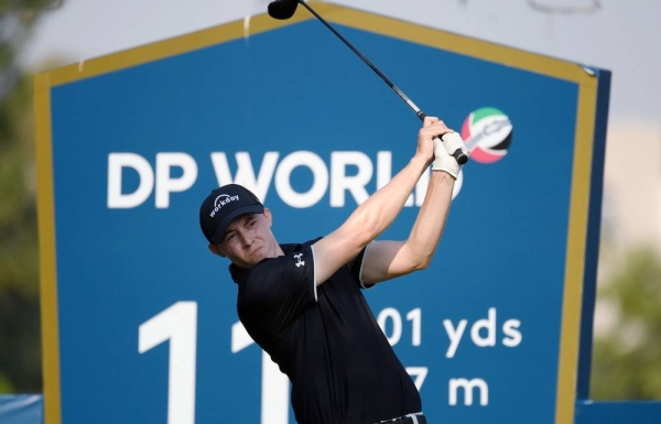 Matthew Fitzpatrick with DP World Tour Championship trophy.