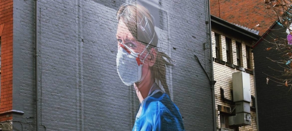 A mural on a wall in Manchester, England, depicts a NHS nurse. — Courtesy photo