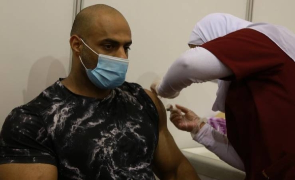 Bahrain's health ministry has reported a massive turnout by citizens and residents in the kingdom to take the coronavirus vaccine with the start of the national vaccination campaign. — BNA photos