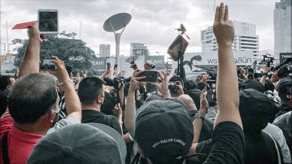 A demonstration takes place on the streets of Bangkok, Thailand. — courtesy Unsplash/Kitthitorn Chaiyuthapoo