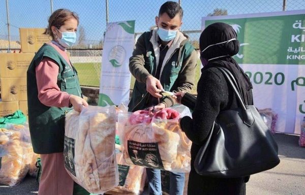 In Beirut, KSrelief distributed Monday winter clothings and shelter materials.